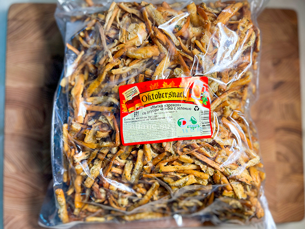 Нитка ЖАРЕНАЯ "Чеснок с зеленью" Oktobersnack 1 кг (сырный продукт) в Прокопьевске